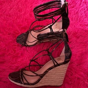 JLo snakeskin strapped wedges